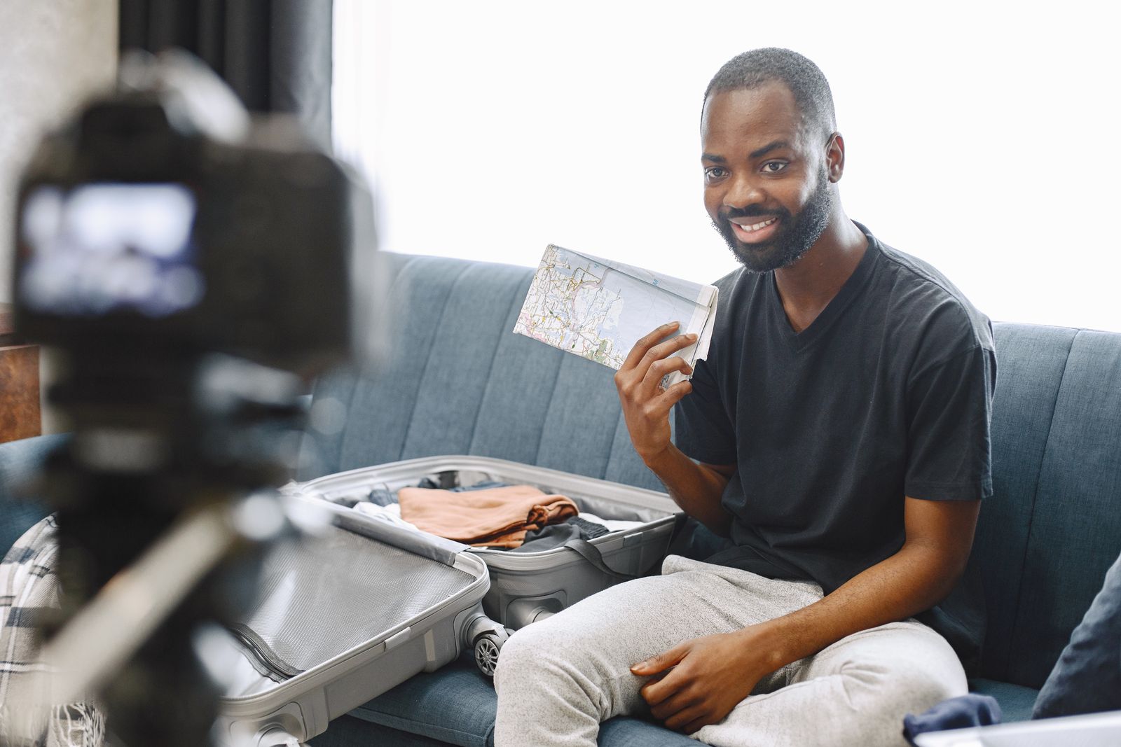 Creator filming a video with a camera